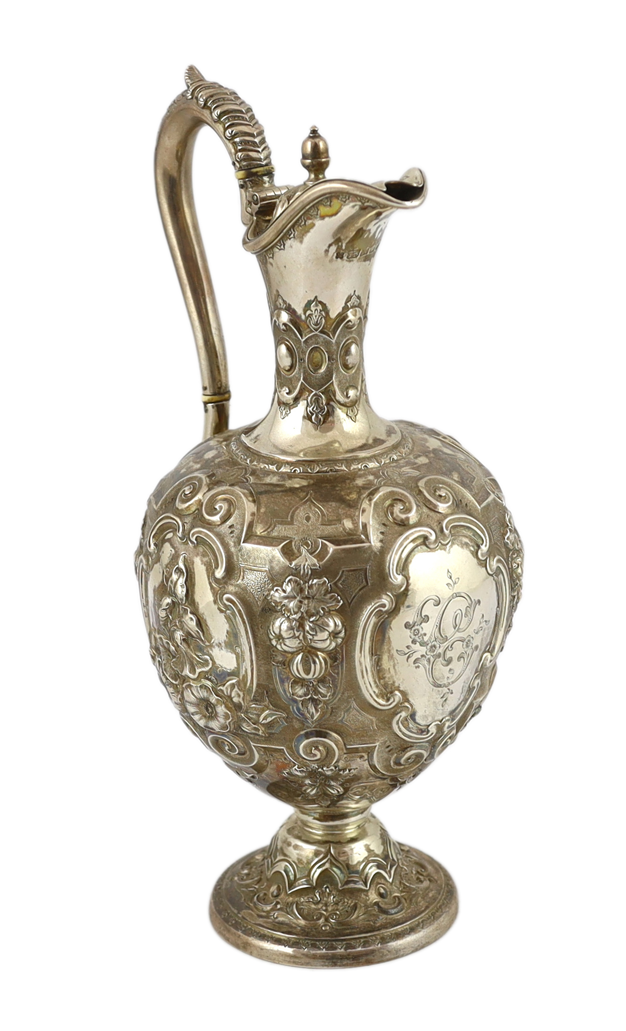 A Victorian embossed silver pyriform hot water ewer, by Martin, Hall & Co, CITES Submission reference V7KAR72D